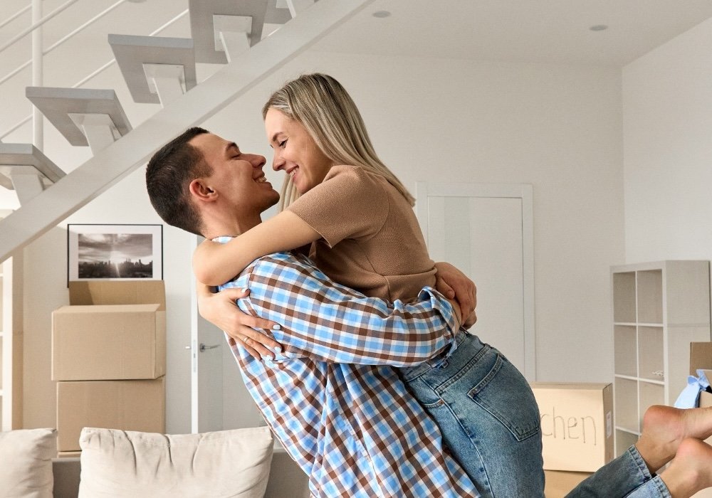 A happy couple with a new bathroom renovation